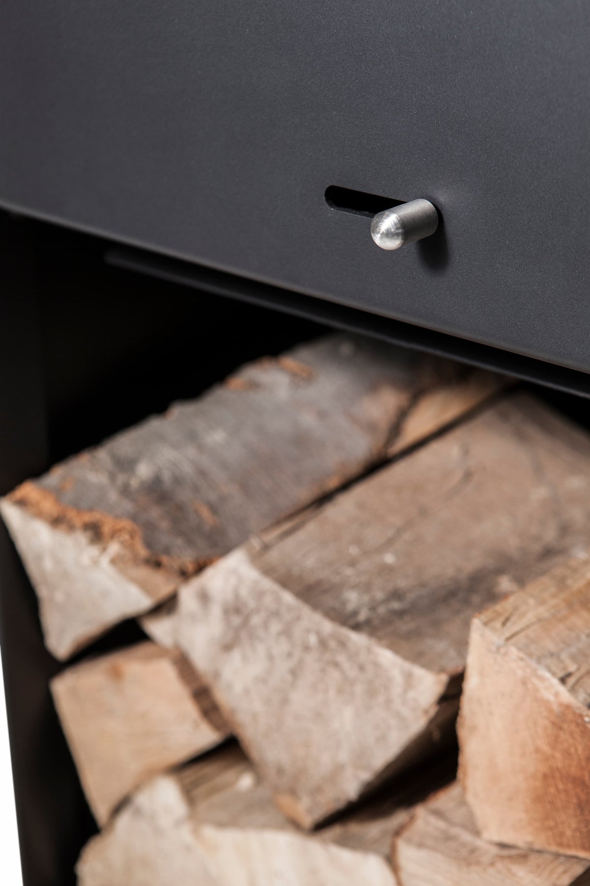 Poêle à bois Aduro Baseline 9 - détail rangement bûches